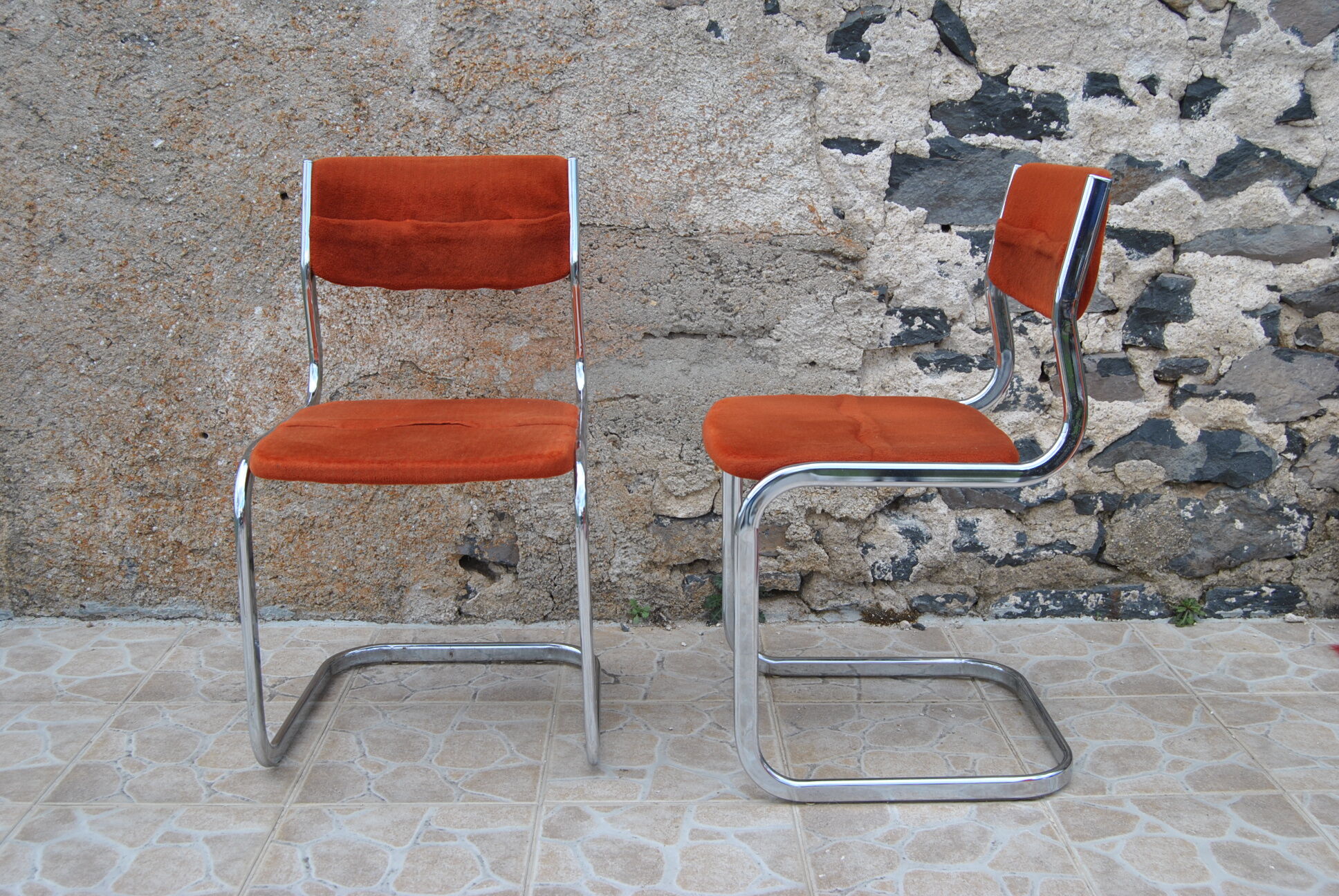 Pair of orange velvet chairs Roche Bobois 70s