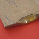 Empty bronze pocket by David Marshall 1970