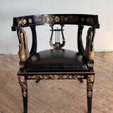 Pair of Empire-style bergère armchairs decorated with swans and lyres