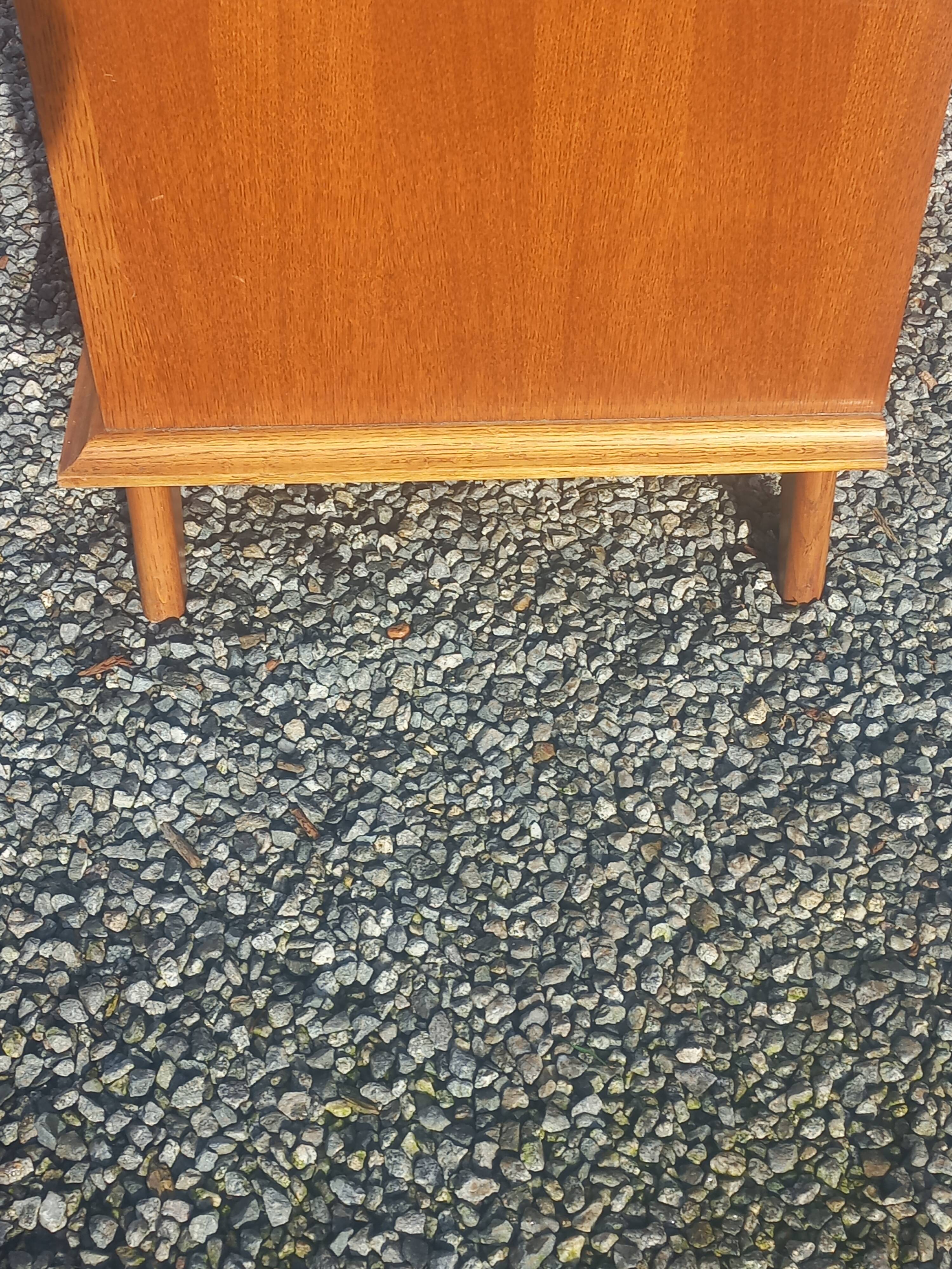 Vintage oak sideboard with splayed legs from the 1950s.
