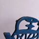 Kettle-shaped cast iron trivet