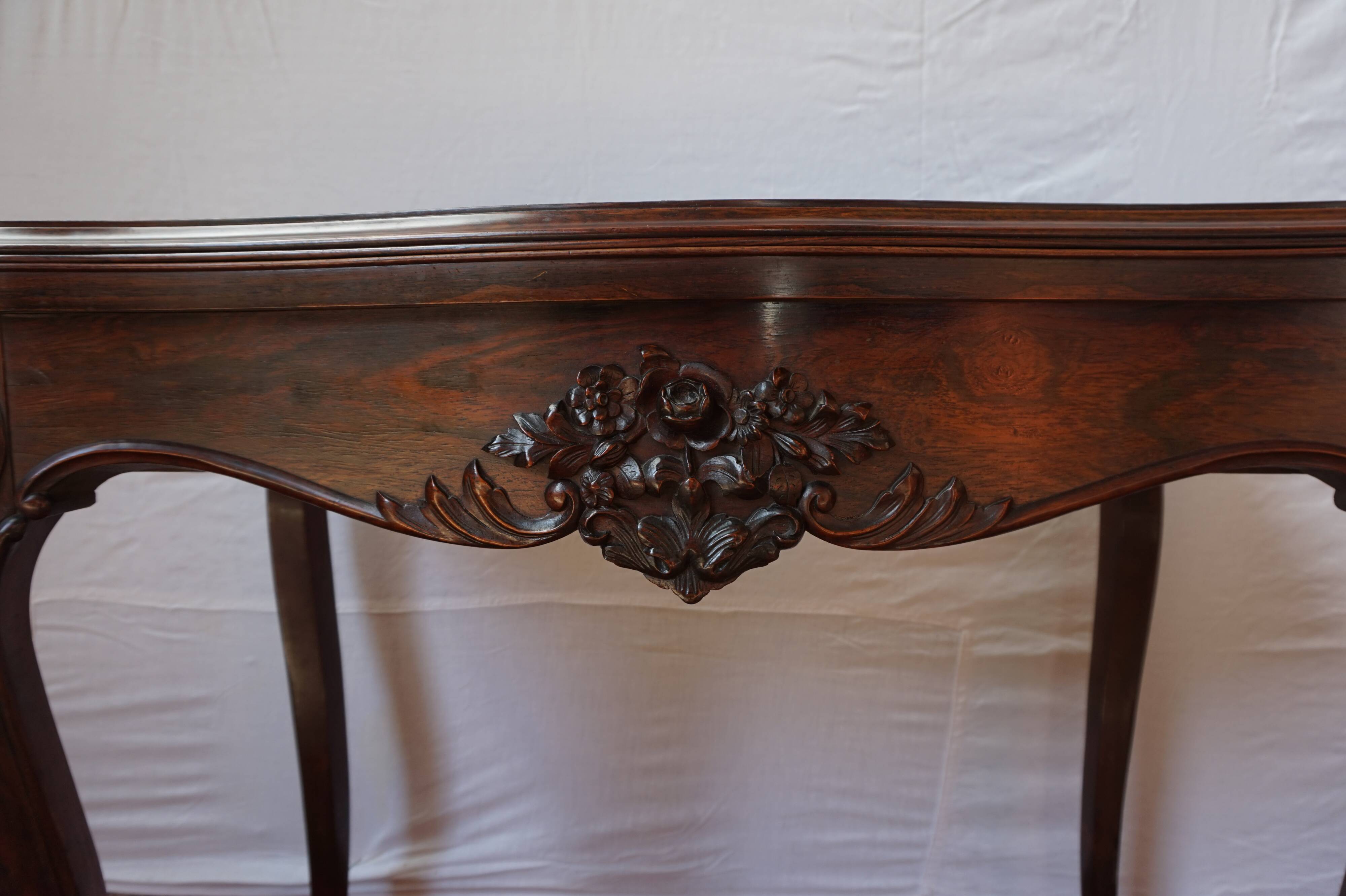 A XIX rosewood games table