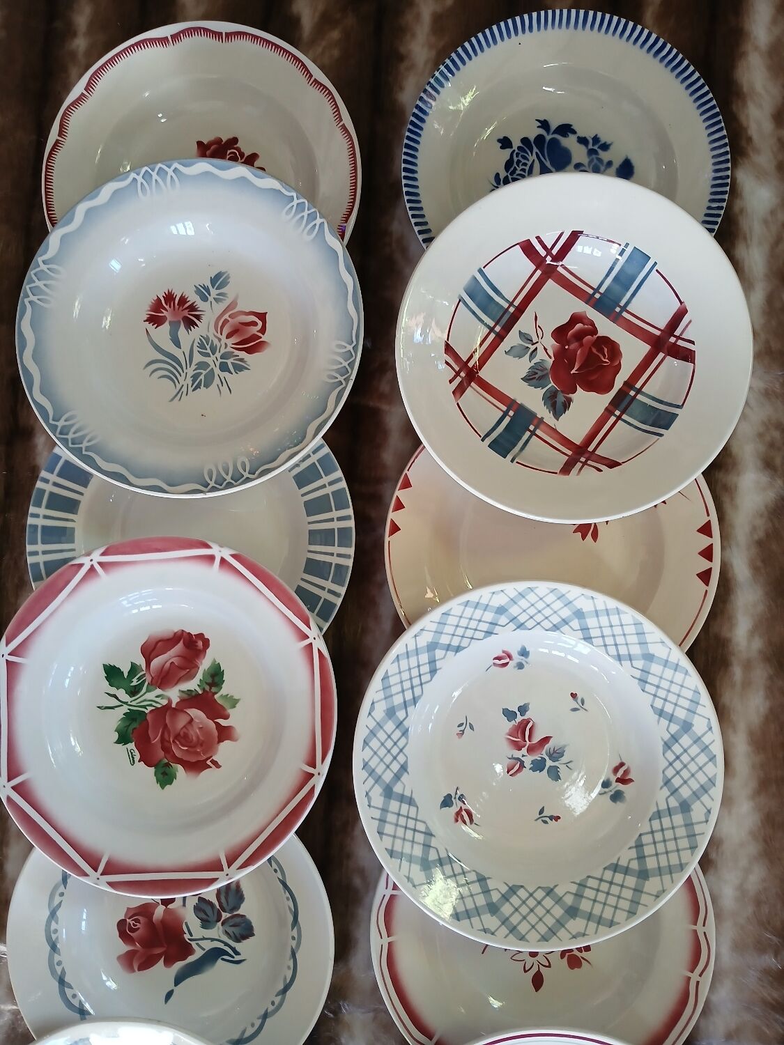 16 mismatched antique deep plates
