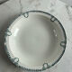 Shallow dish St Amand decorated with green crowns.