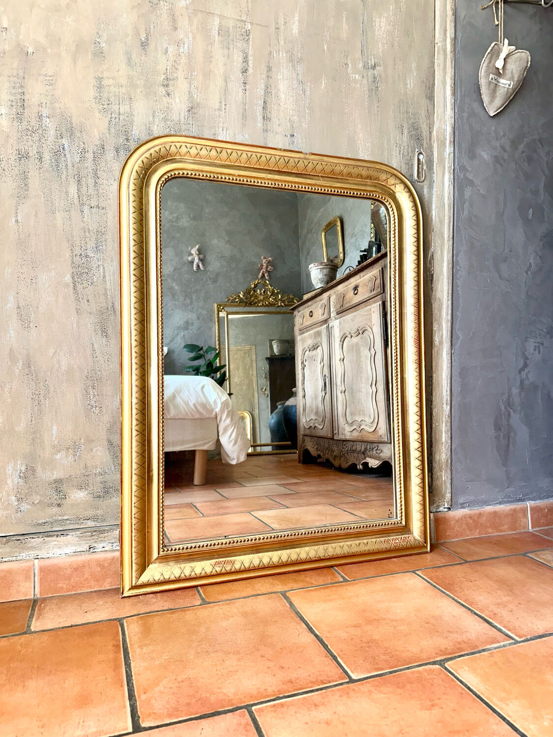 Louis-Philippe antique gilded mirror from the 19th century.