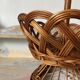 Wicker fruit bowl on a stand