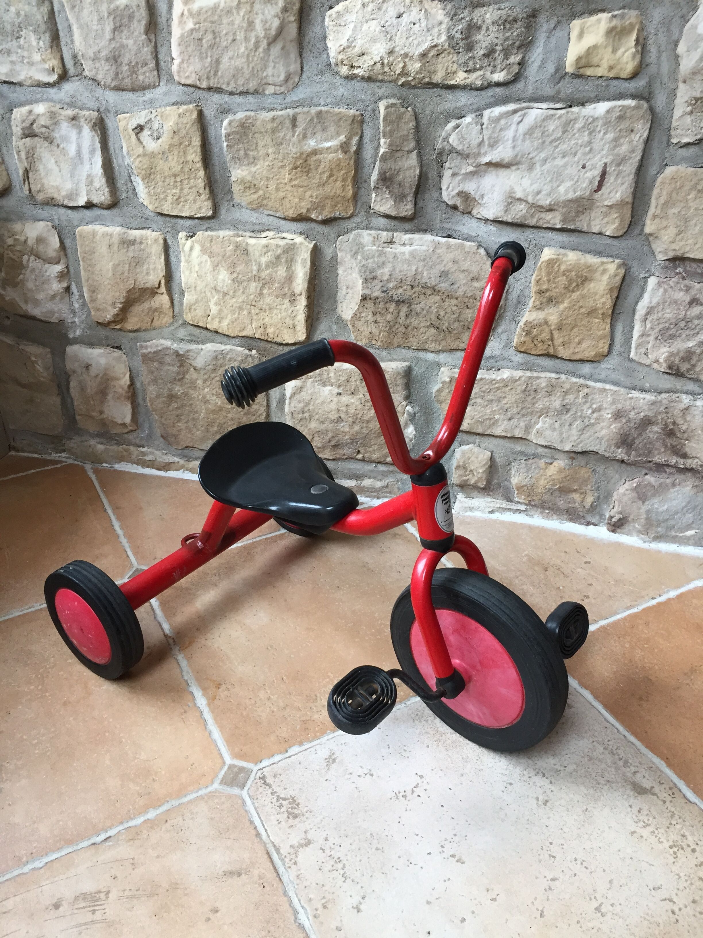 Red child tricycle