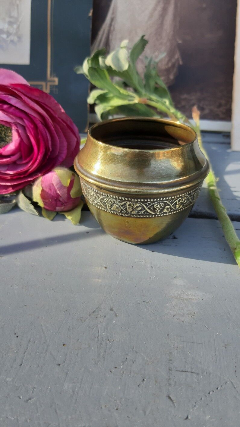 Brass pot cover