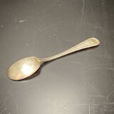 Egg cup with silver metal spoon