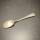 Egg cup with silver metal spoon