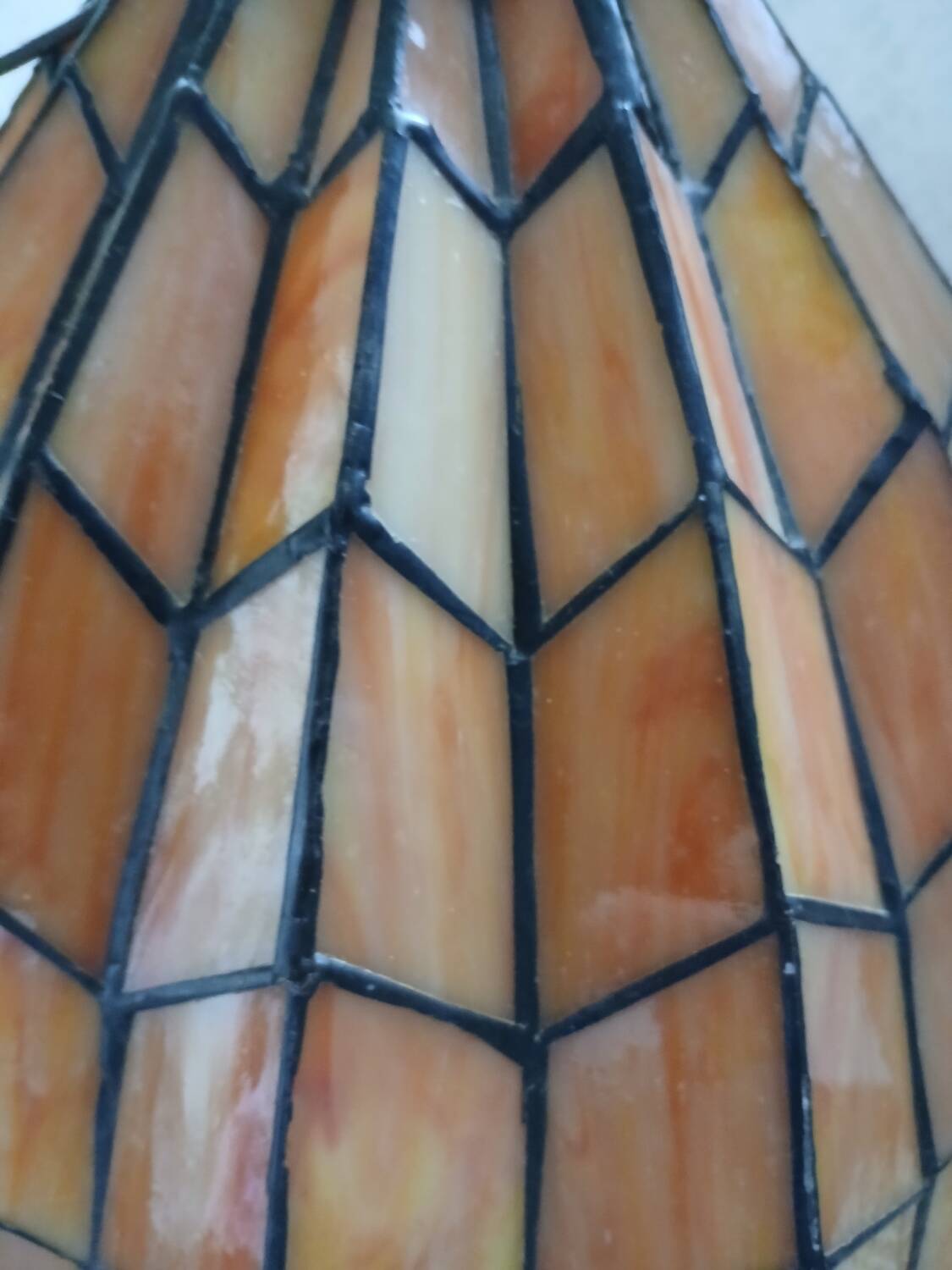 Antique stained glass and bronze pendant light
