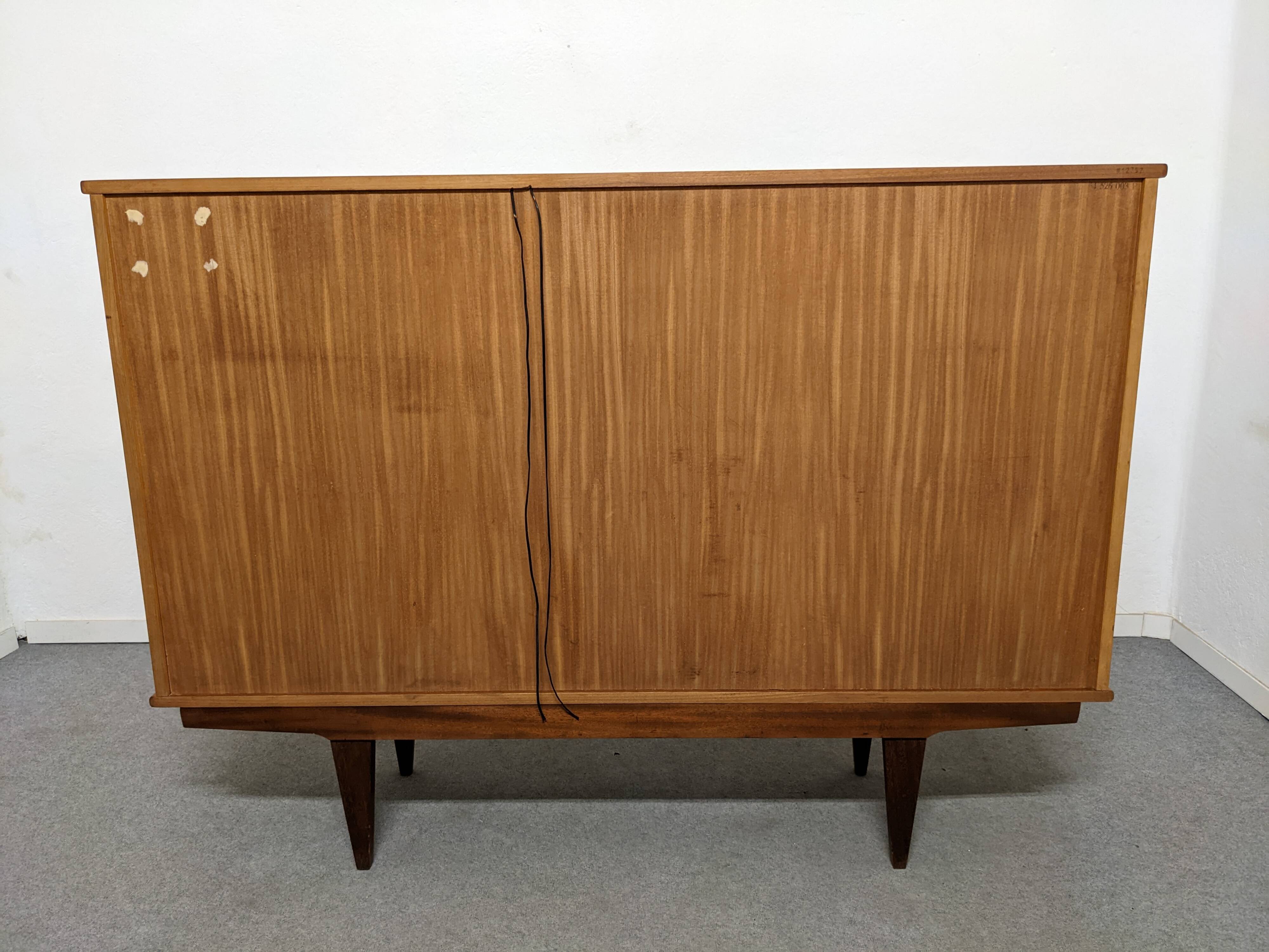 High sideboard, display cabinet and secretary, Scandinavian in teak, France around 1960.