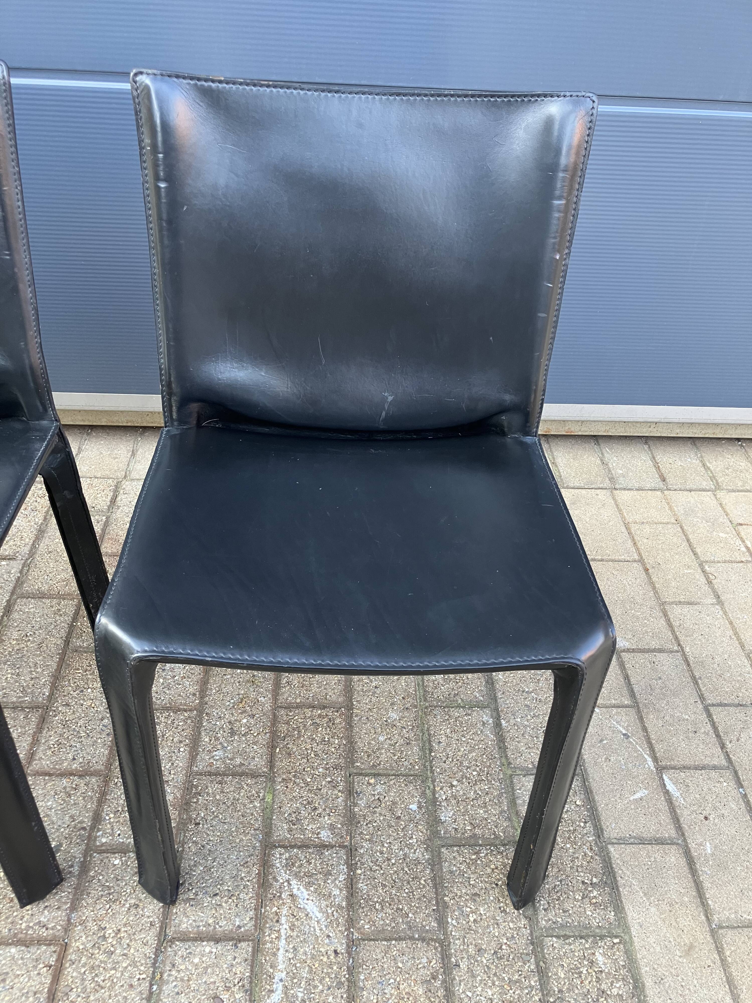 4 black Cassina Cab chairs by Mario Bellini