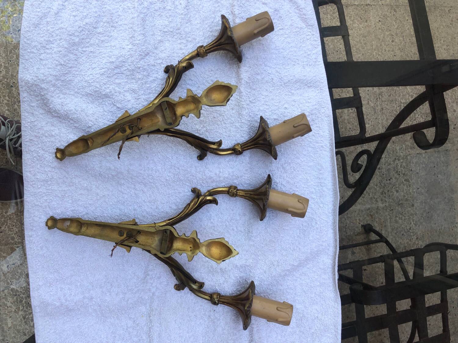 Pair of Louis XVI style bronze wall lights