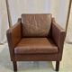 Fauteuil danois en cuir marron à dossier bas 1960