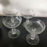 4 glasses of carved crystal champagne