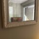 Antique Louis-Philippe mirror with pearls and shells, white patina.