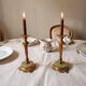 Pair of neoclassical candle holders in gilded bronze and green onyx, bust of