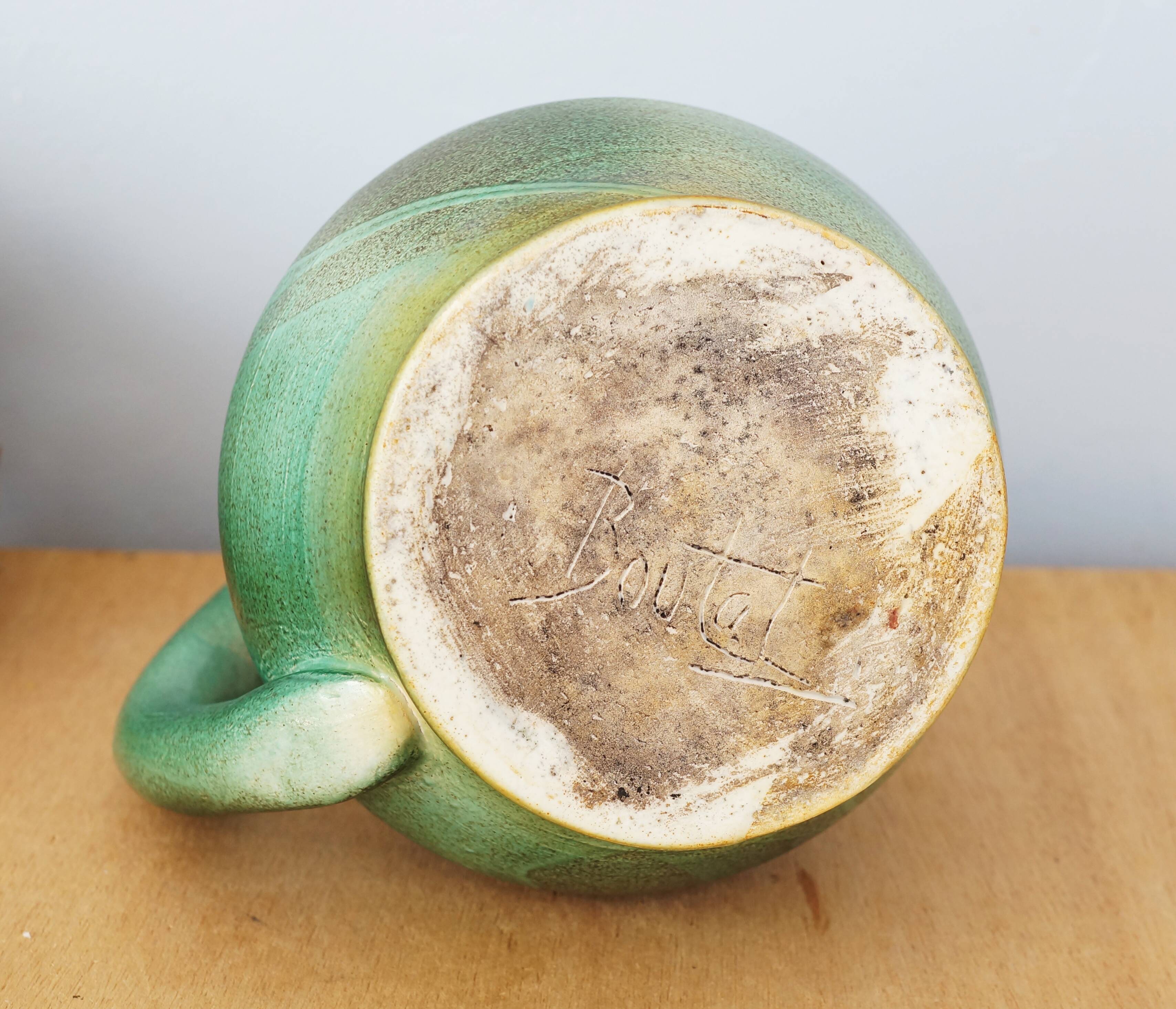 Ceramic jug enamelled in shades of green, signed, vintage