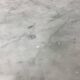 Set of two bistro tables in marble and wrought iron