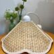 Suspension fleur en rotin vintage beige