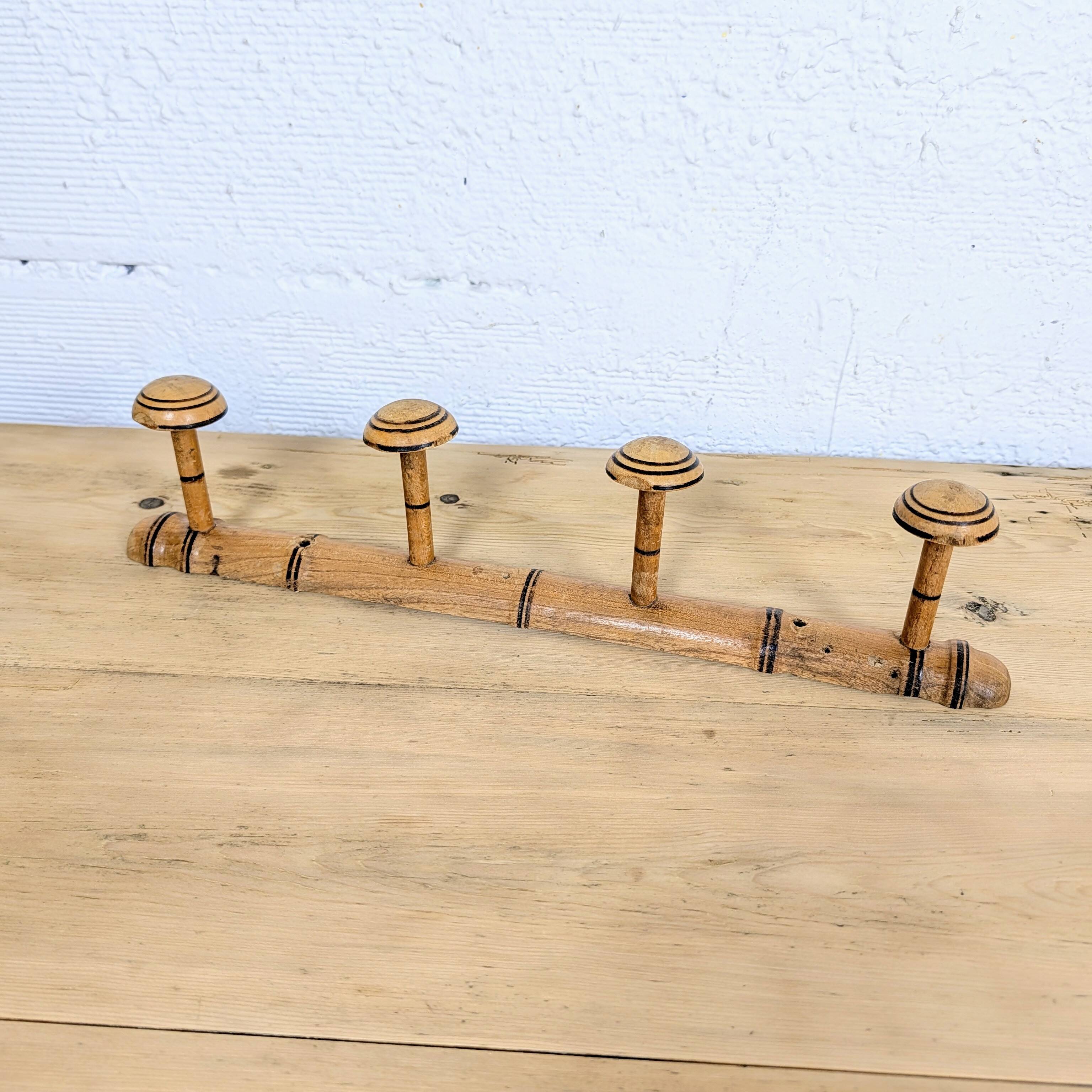 Turned wooden coat rack