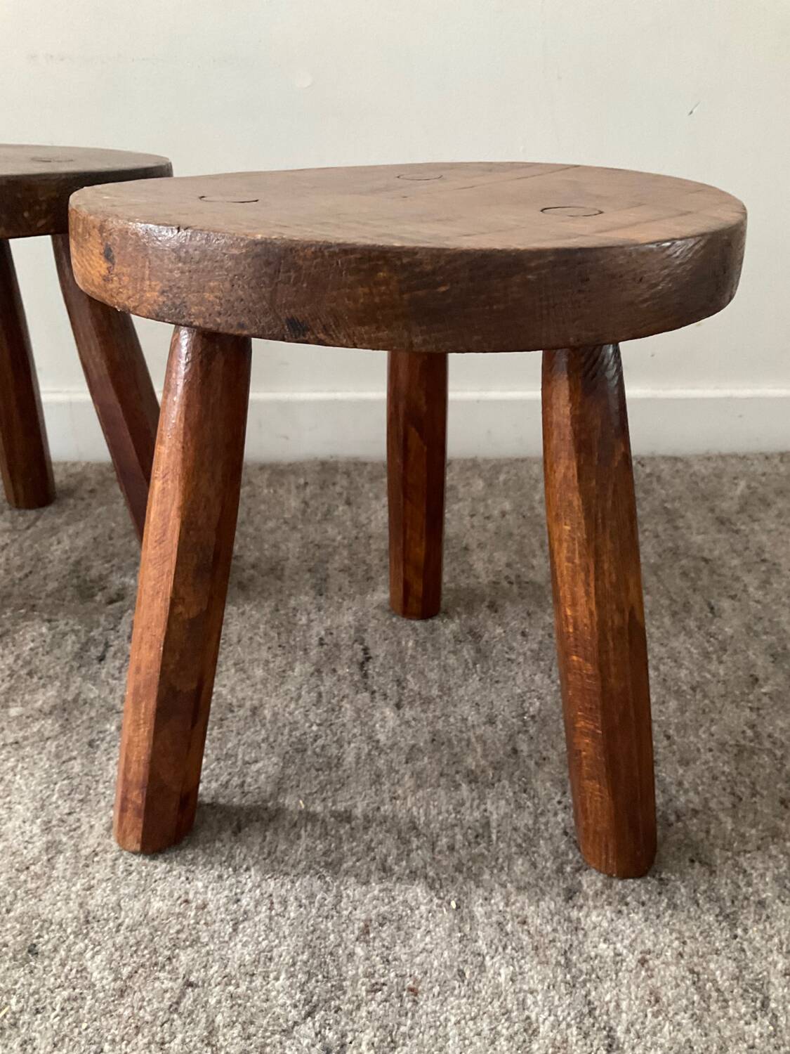 Pair of wooden tripod foot stools
