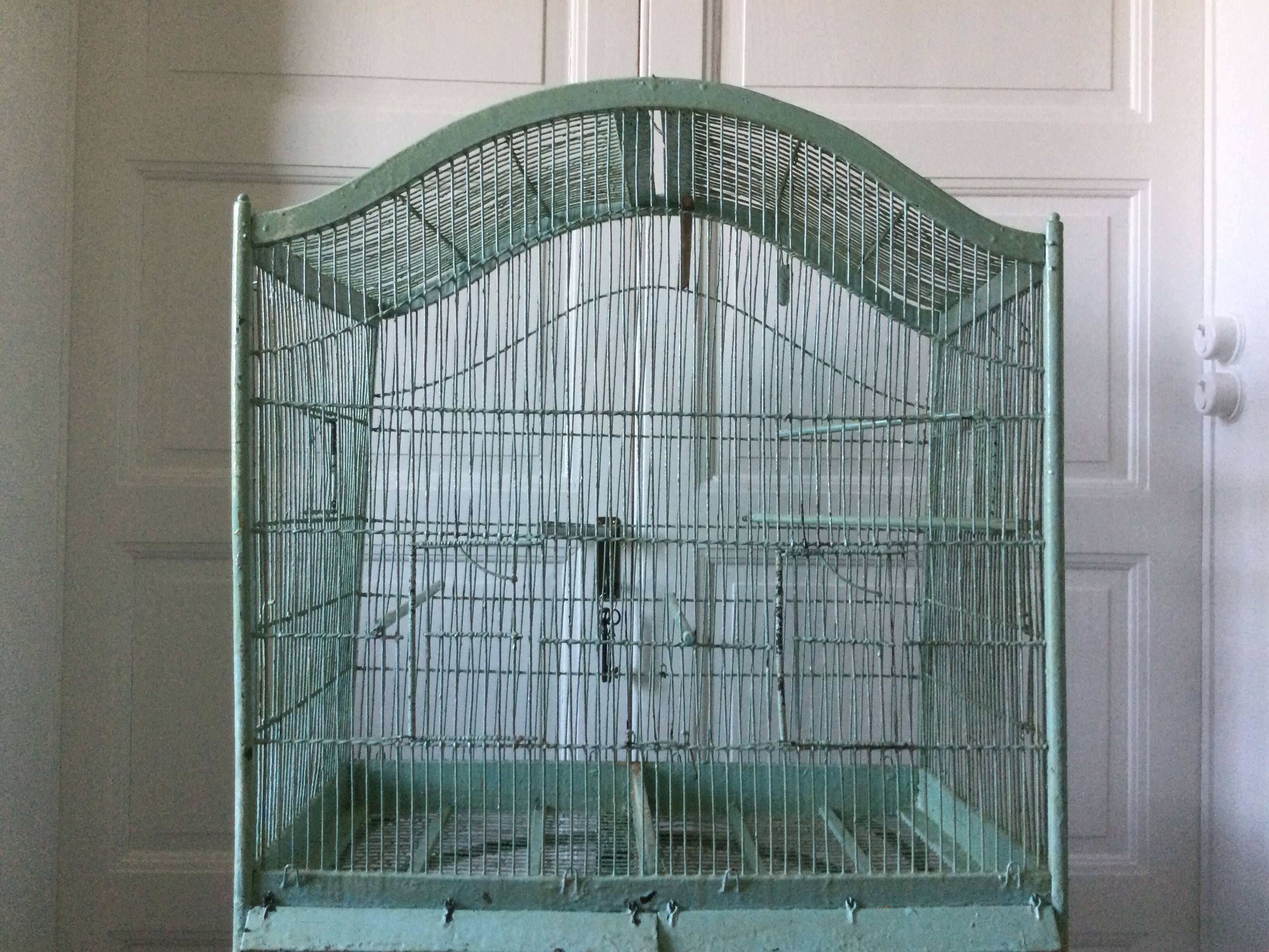 Old wooden and metal birdcage