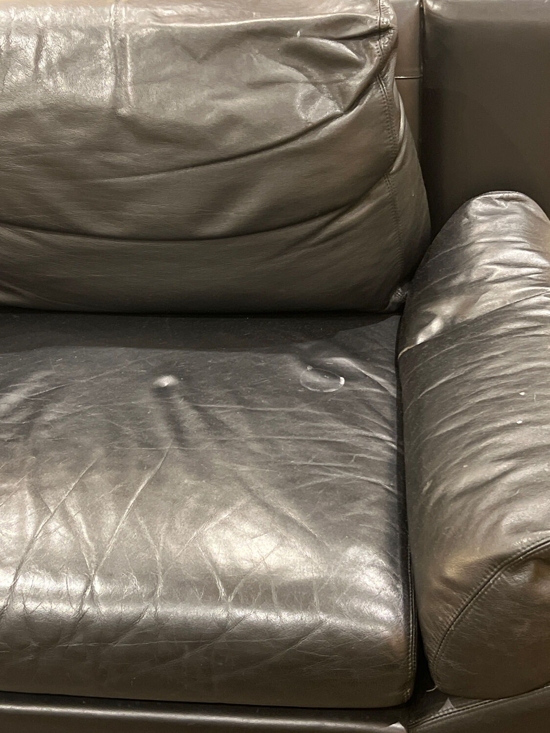 Vintage black leather 2-seater sofa from the 70s by Edelhard Harlis – 180 cm