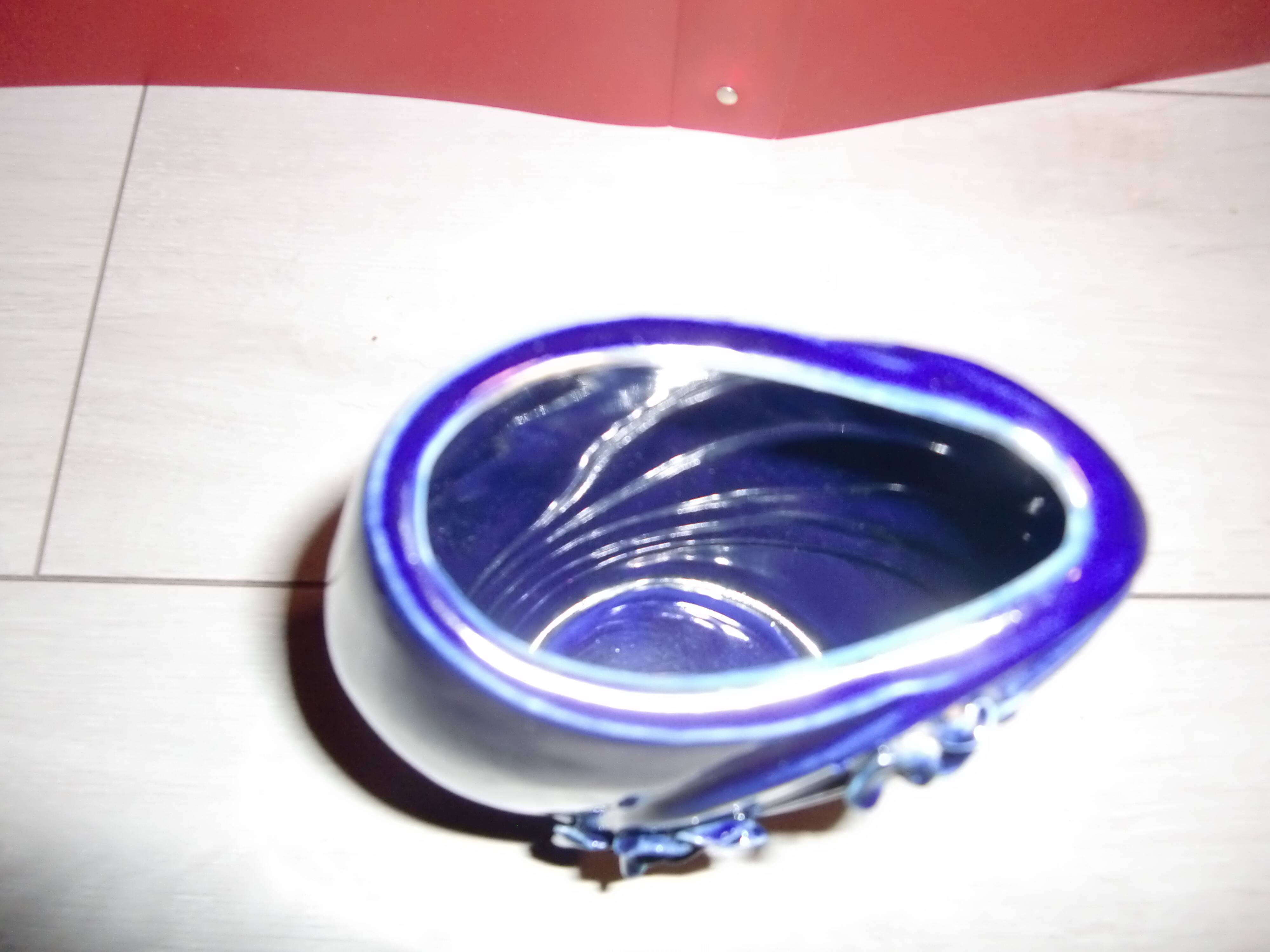 Blue lacquered vase with flowers & applied leaves