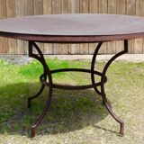 Garden table with wrought iron base