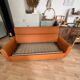 Vintage orange convertible sofa