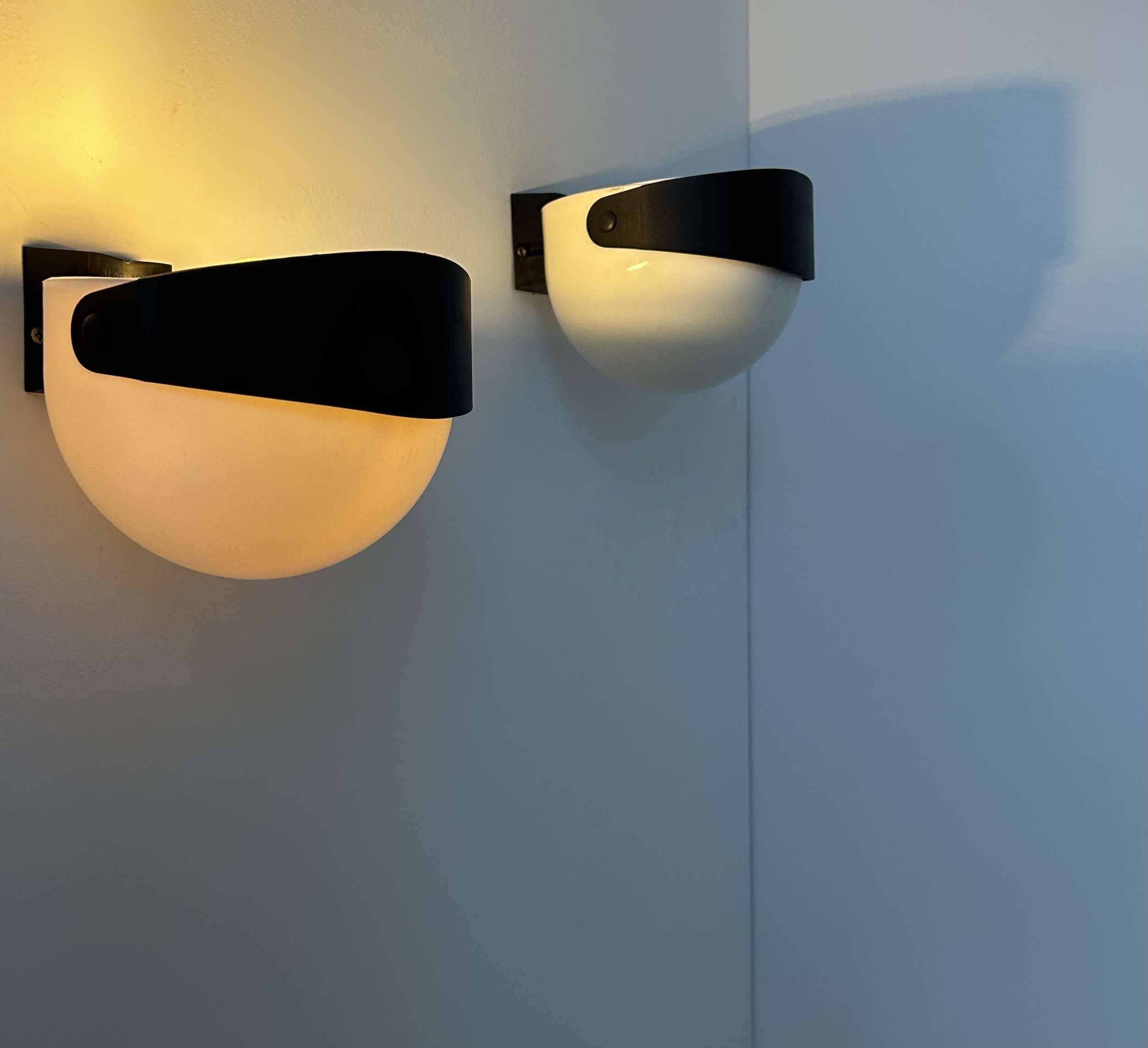 Pair of vintage wall lights, white and black Perspex, Sweden 1970