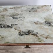 Mid-century drawer chest in mahogany, brass and glass.
