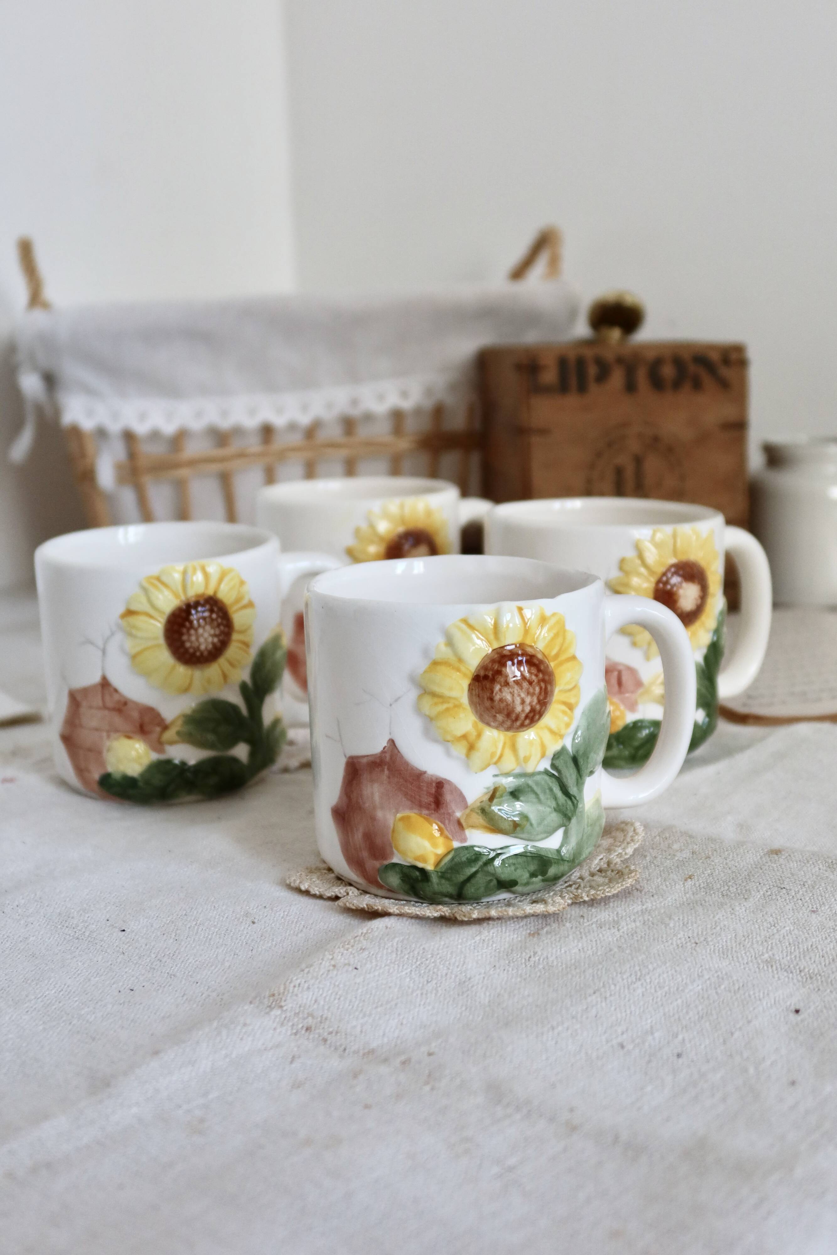Set of 4 vintage barbotine cups / mugs with polychrome sunflower pattern
