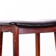 4 Danish high stools, rosewood and black leather, Knud Bent for Dyrlund.