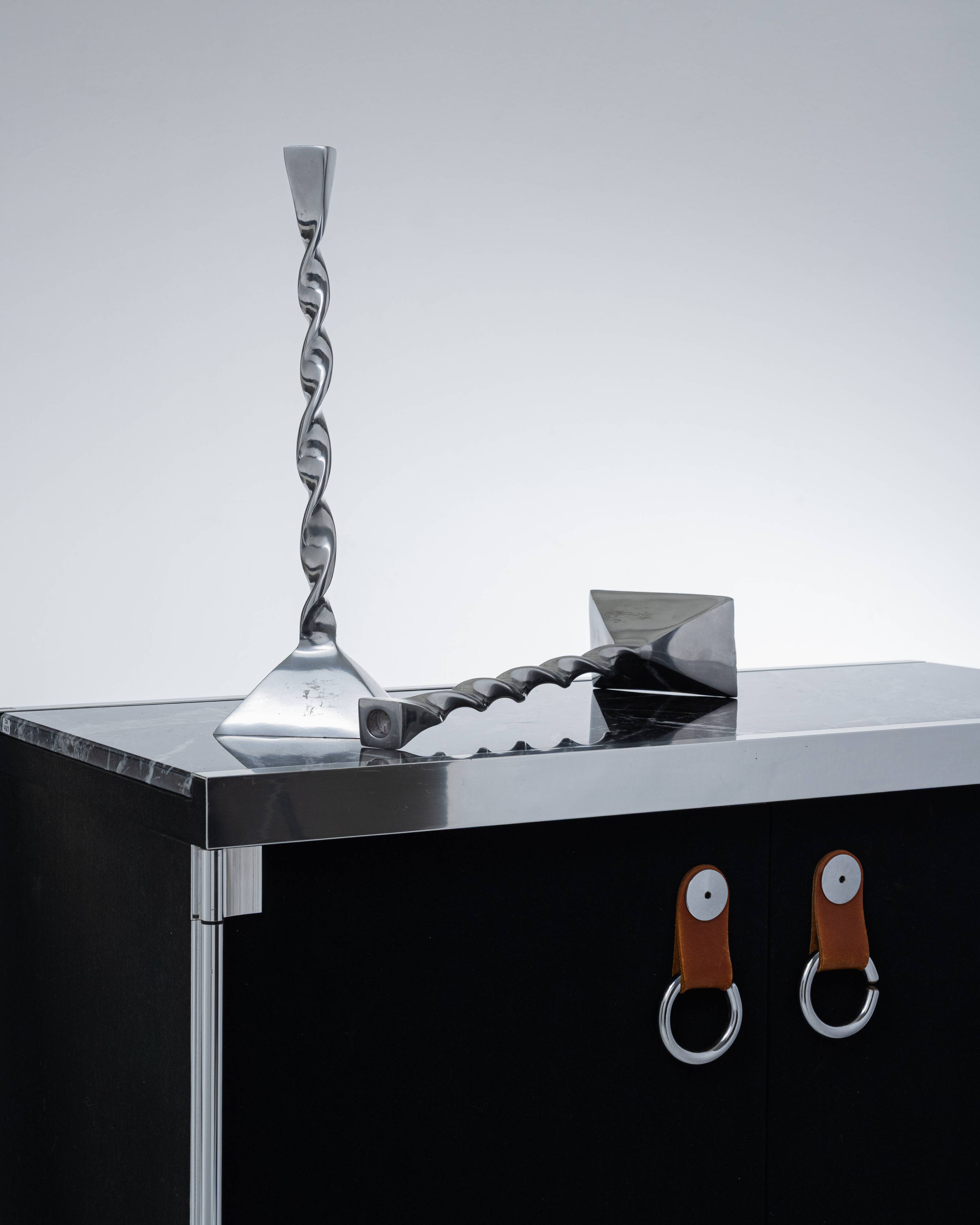 Pair of twisted metal candlesticks, 1980s
