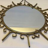 Miroir soleil en métal doré