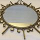 Gold metal sun mirror