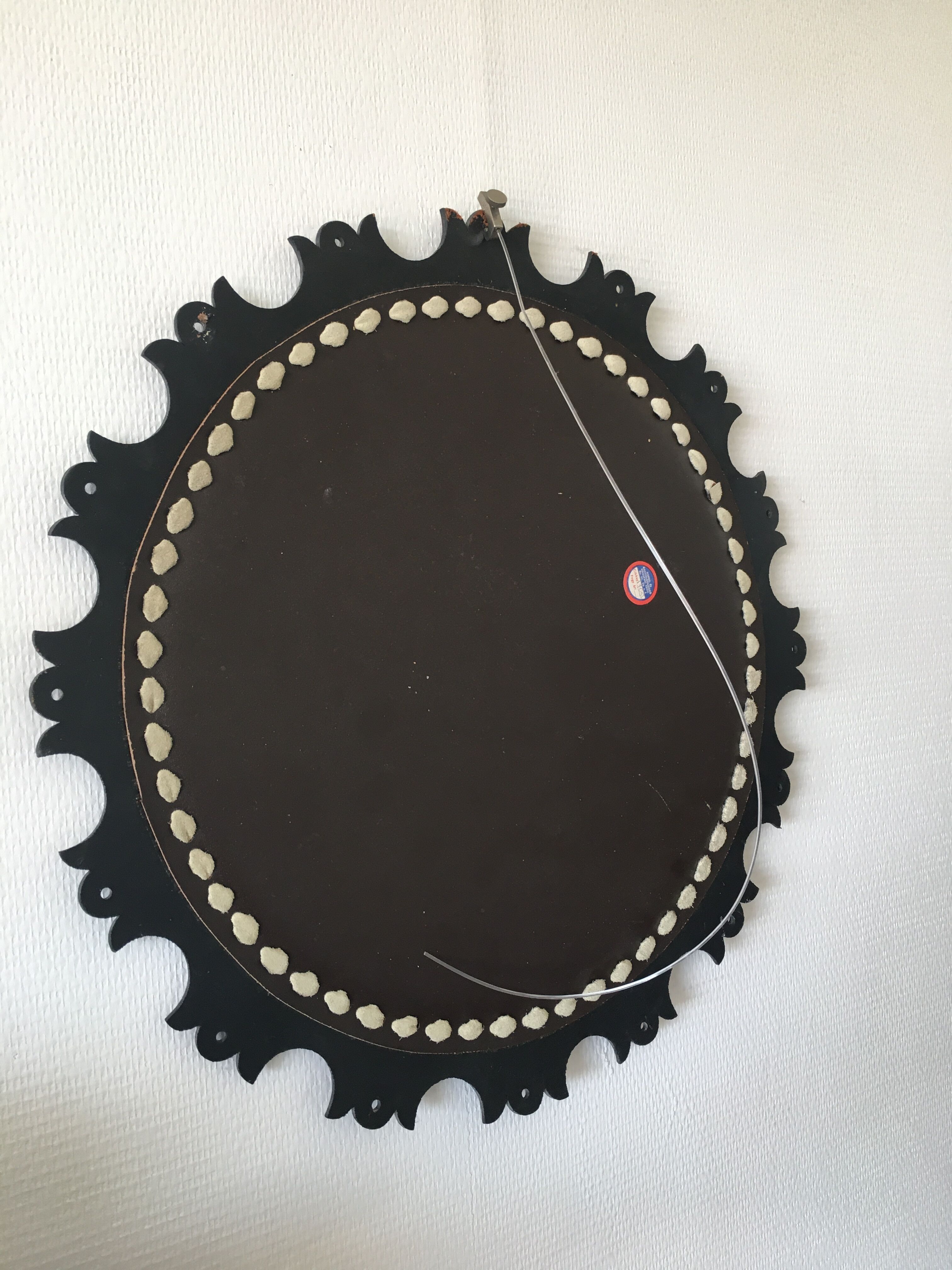 Round leather mirror, 1960s