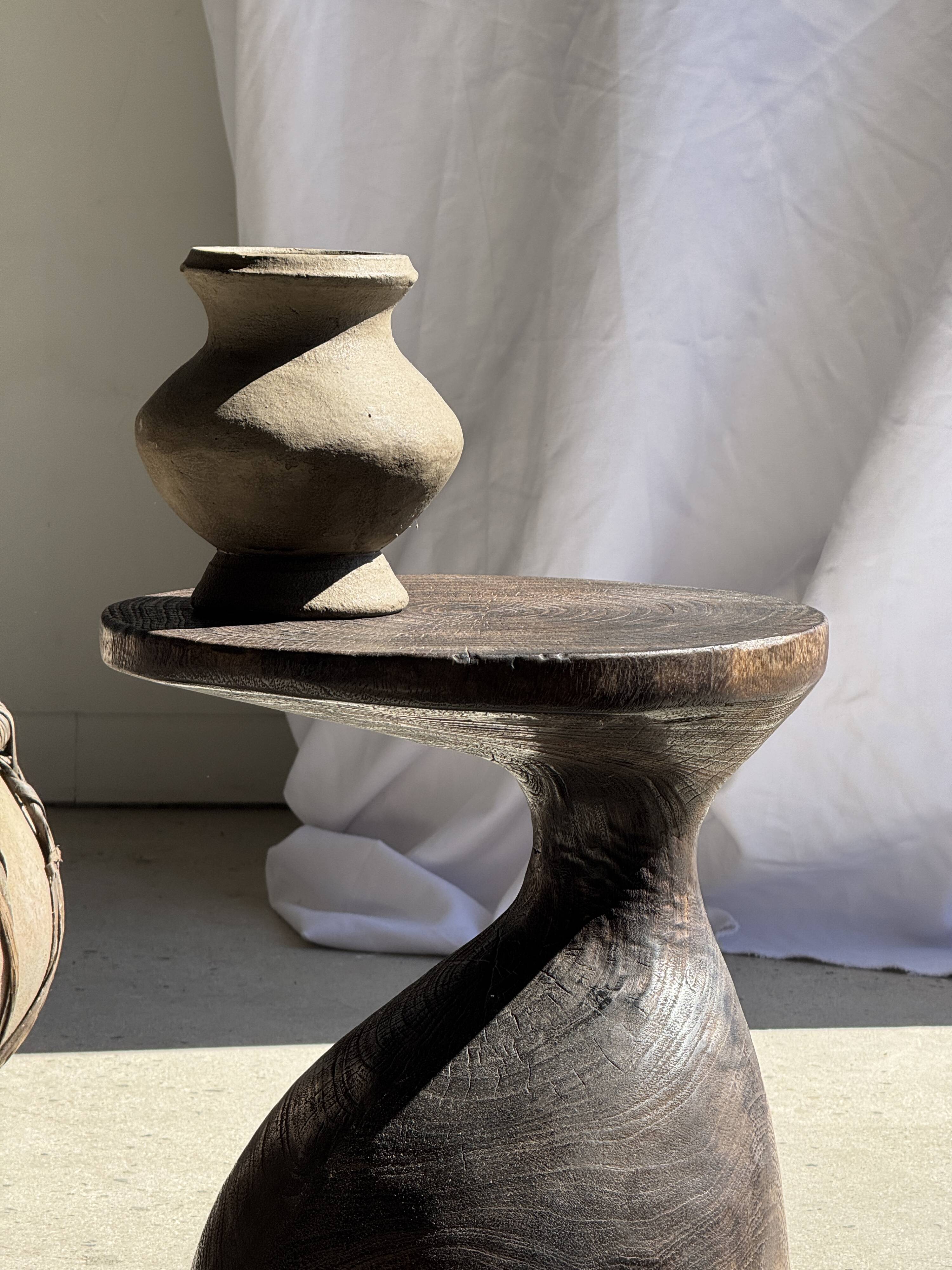 Small brutalist handcrafted terracotta vase with a pedestal, Indonesian, H19 D17.