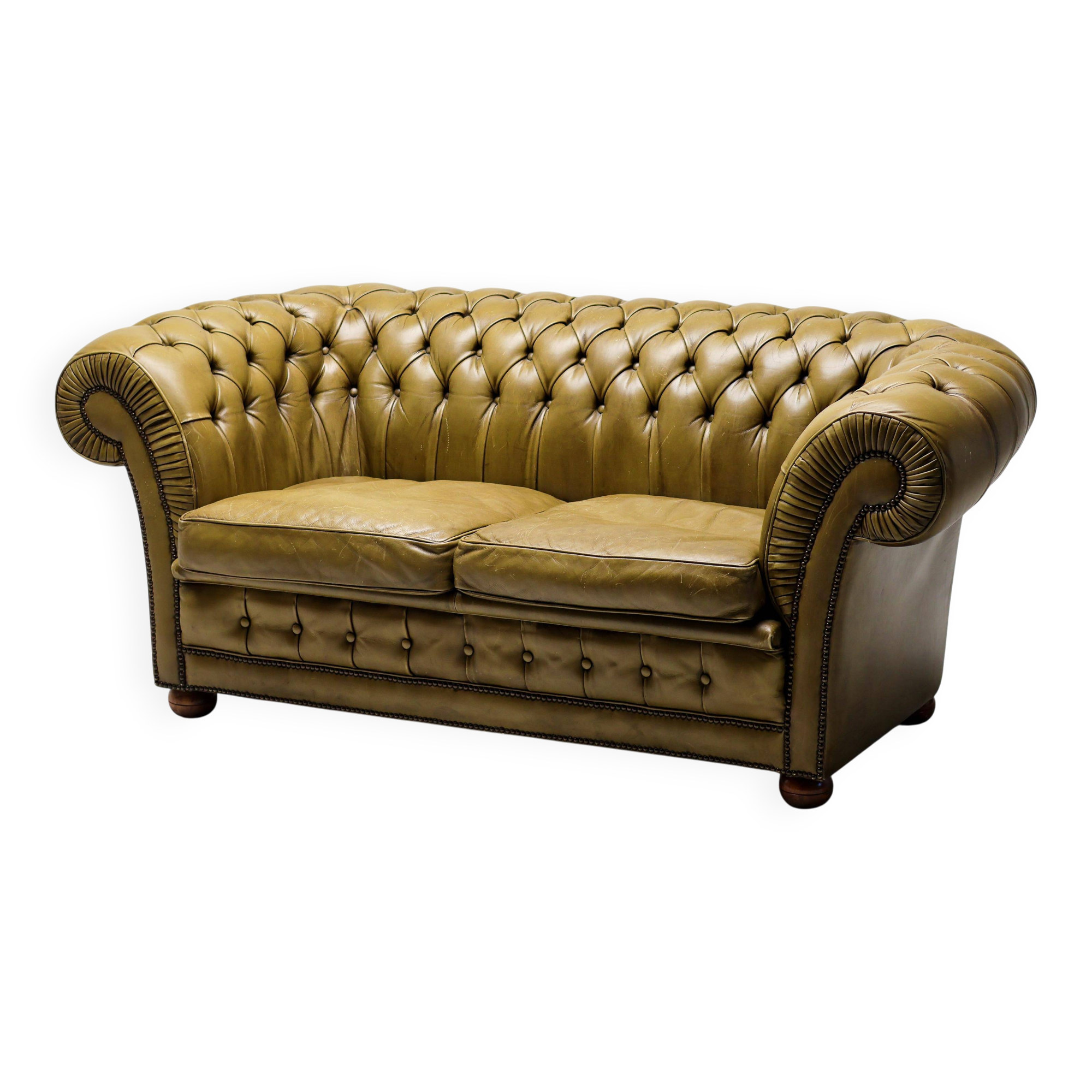 Vintage mid-century Chesterfield sofa in Greene & Greene leather.