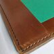 Underhand in saddle leather and vintage brushed metal