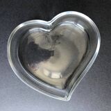 Empty glass heart-shaped pocket