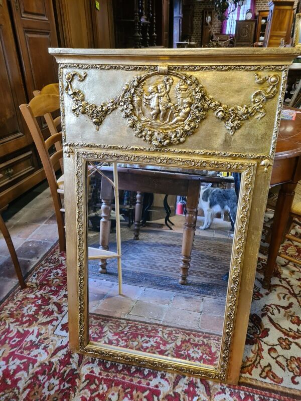 Miroir trumeau patiné doré