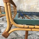 Twin rattan beds with built-in bedside tables