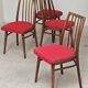 Set of 4 red dining chairs by Antonin Suman for Interier Praha.