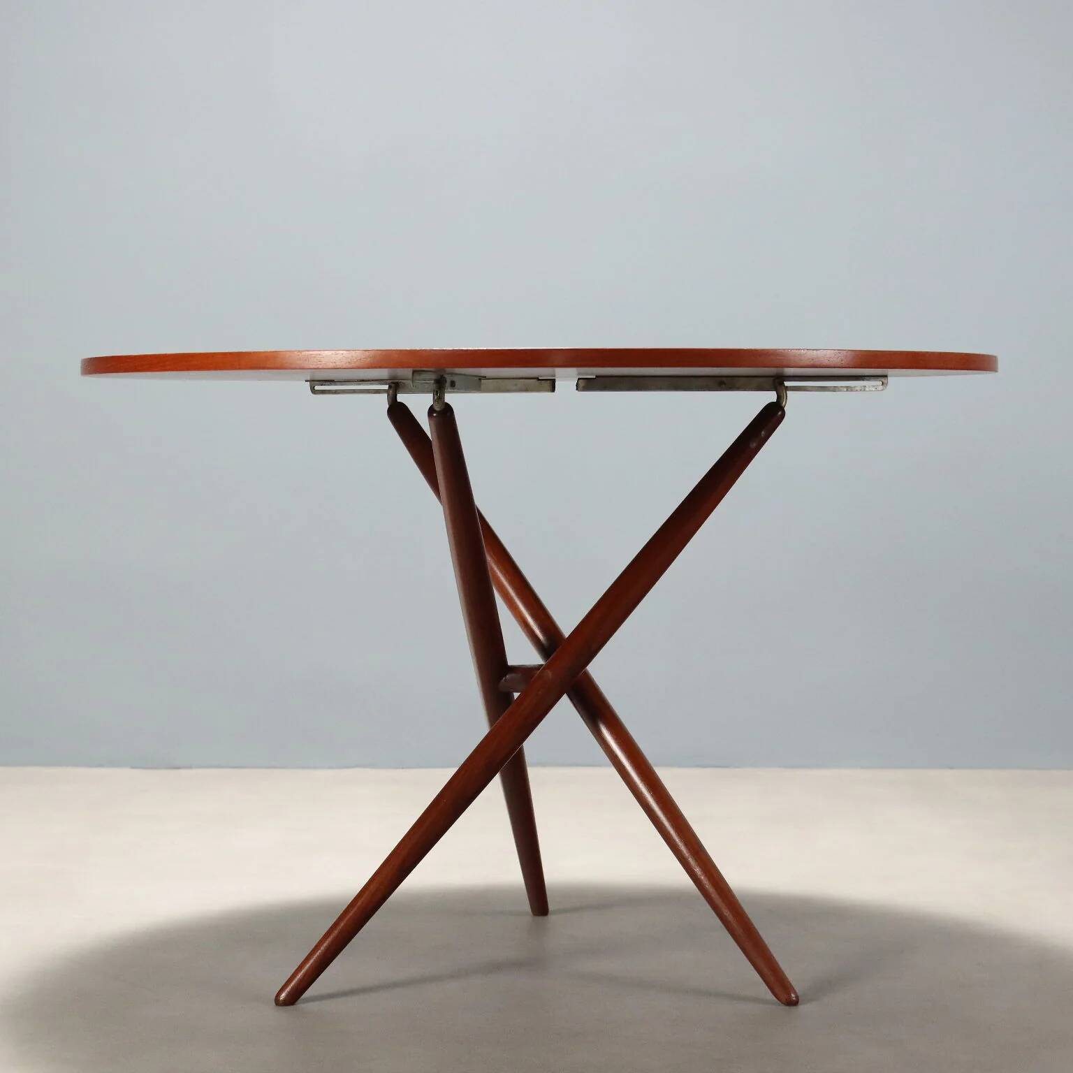 Vintage teak dining table designed in Italy from the 1960s.