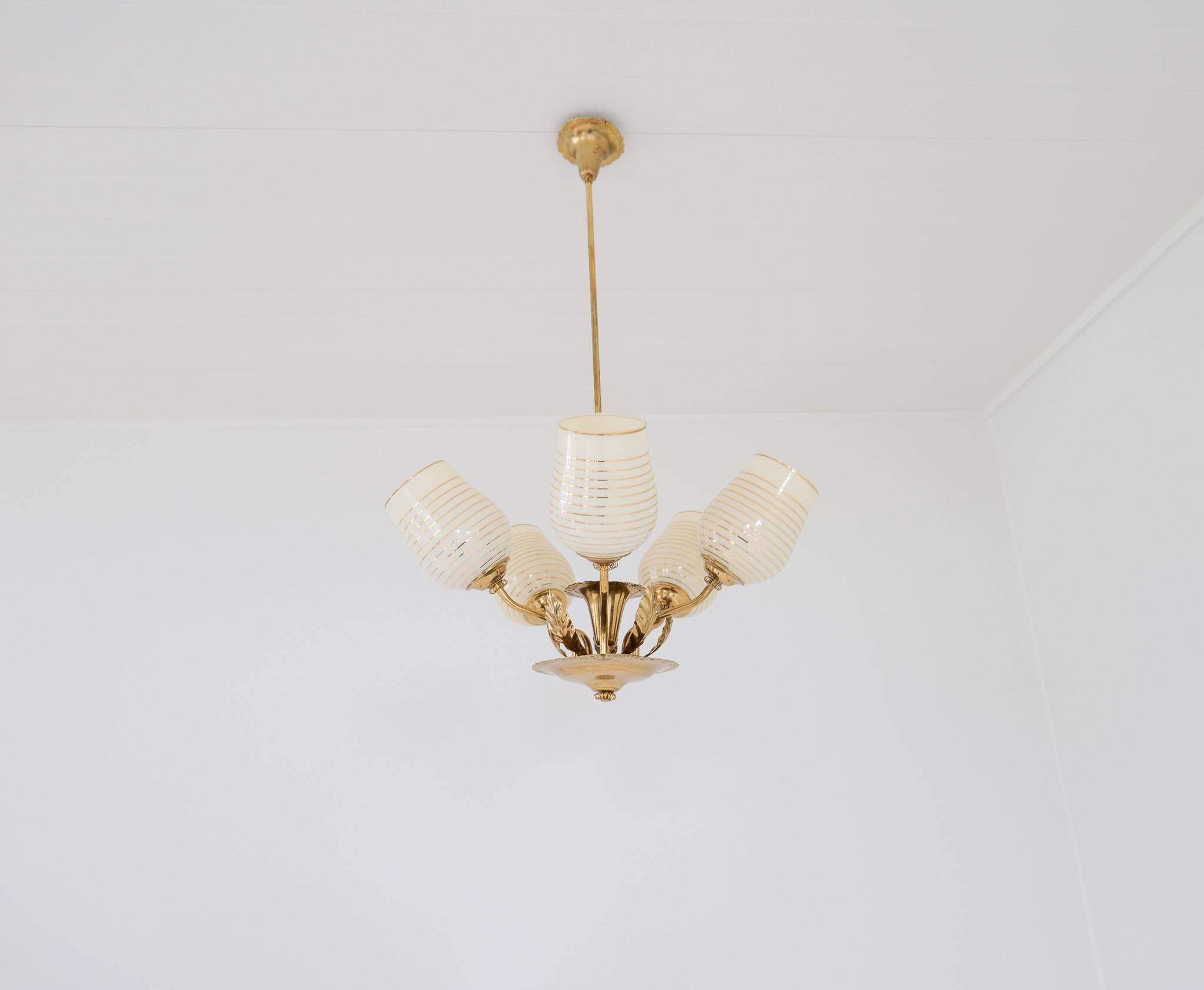 Mid-century brass and glass pendant light by Sario, Finland, 1950s.