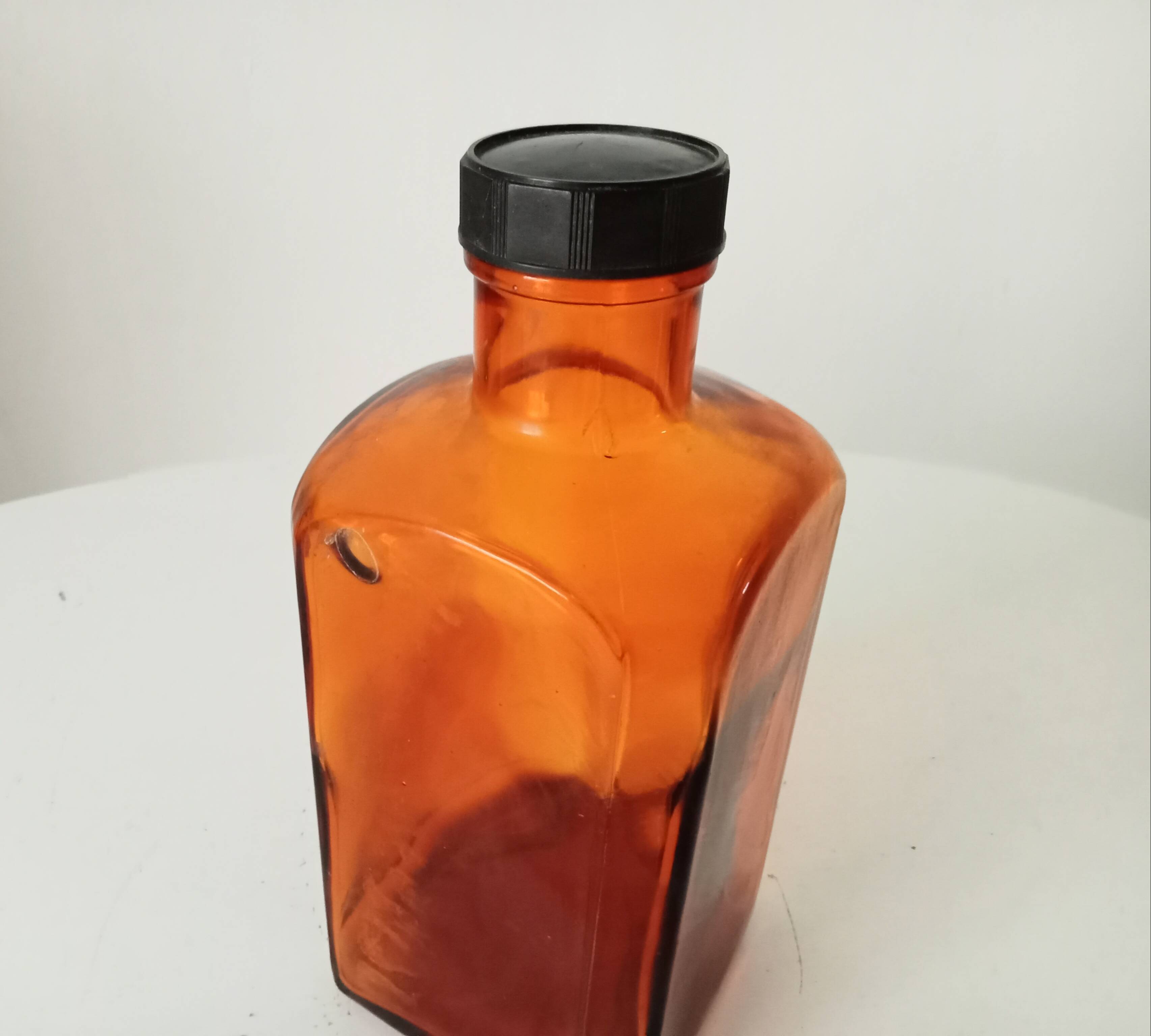 Old amber pharmacy bottle